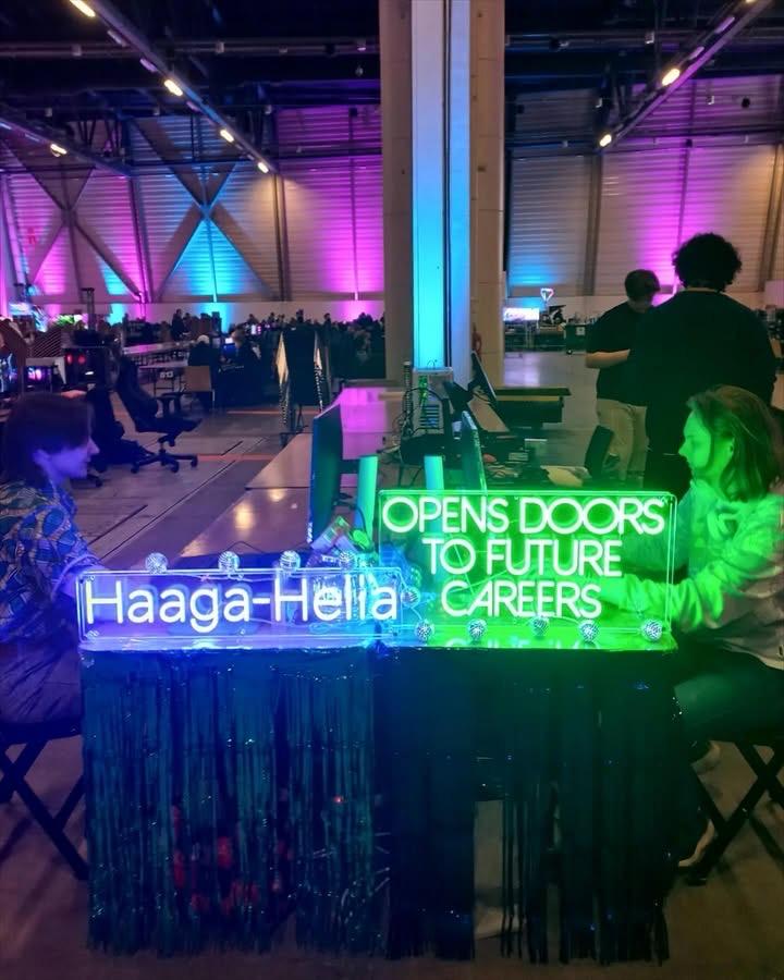 LED neon signs displayed at a Haaga-Helia careers event