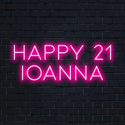 Happy 21 Ioanna Personalized LED Neon Sign, glowing lettering on dark brick background