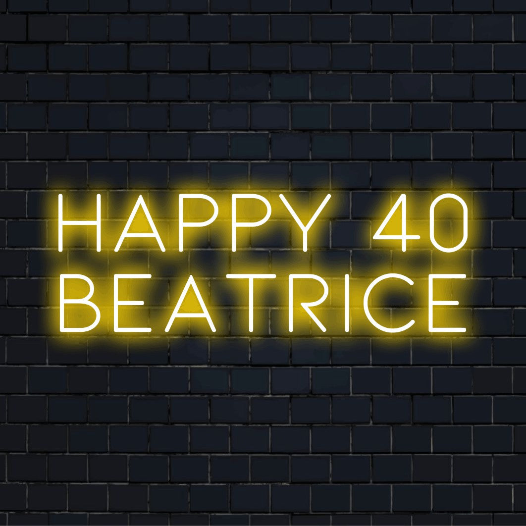 Happy 40 Beatrice Custom Name Neon Sign, bright neon glow against black brick wall