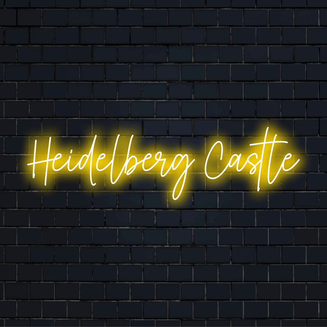 Heidelberg Castle Neon Sign, glowing lettering on dark brick wall