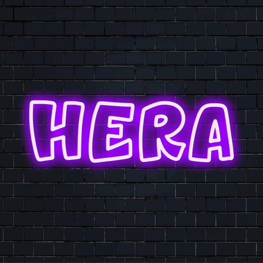 Hera Neon Sign, bright LED glow against black brick wall