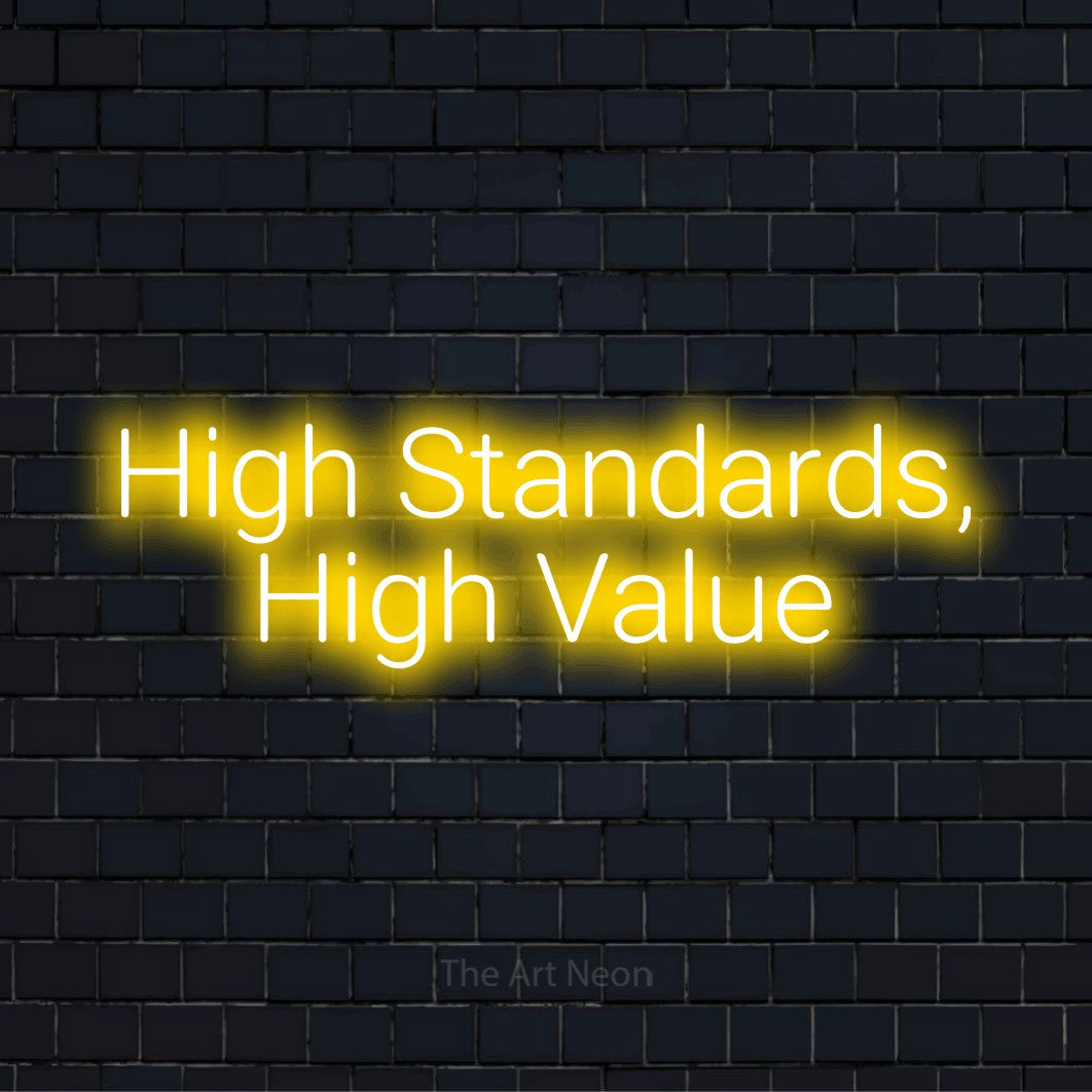 "High Standards, High Value" text design with neon effect on a black brick wall