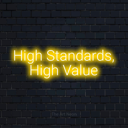 "High Standards, High Value" text design with neon effect on a black brick wall