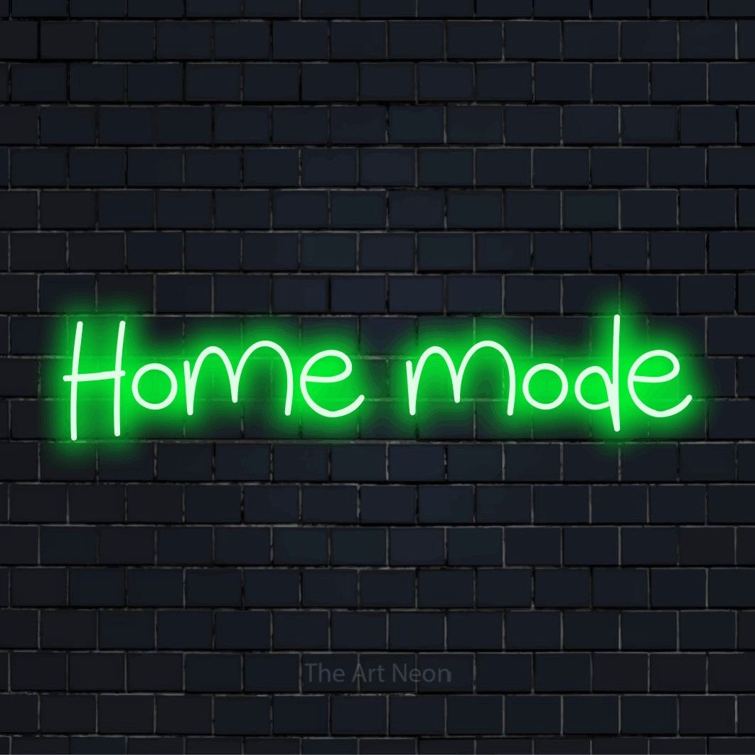 "Home Mode" script-style LED neon sign on a black brick wall