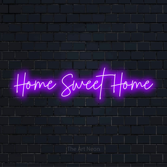 "Home Sweet Home" script-style LED neon sign on a black brick wall