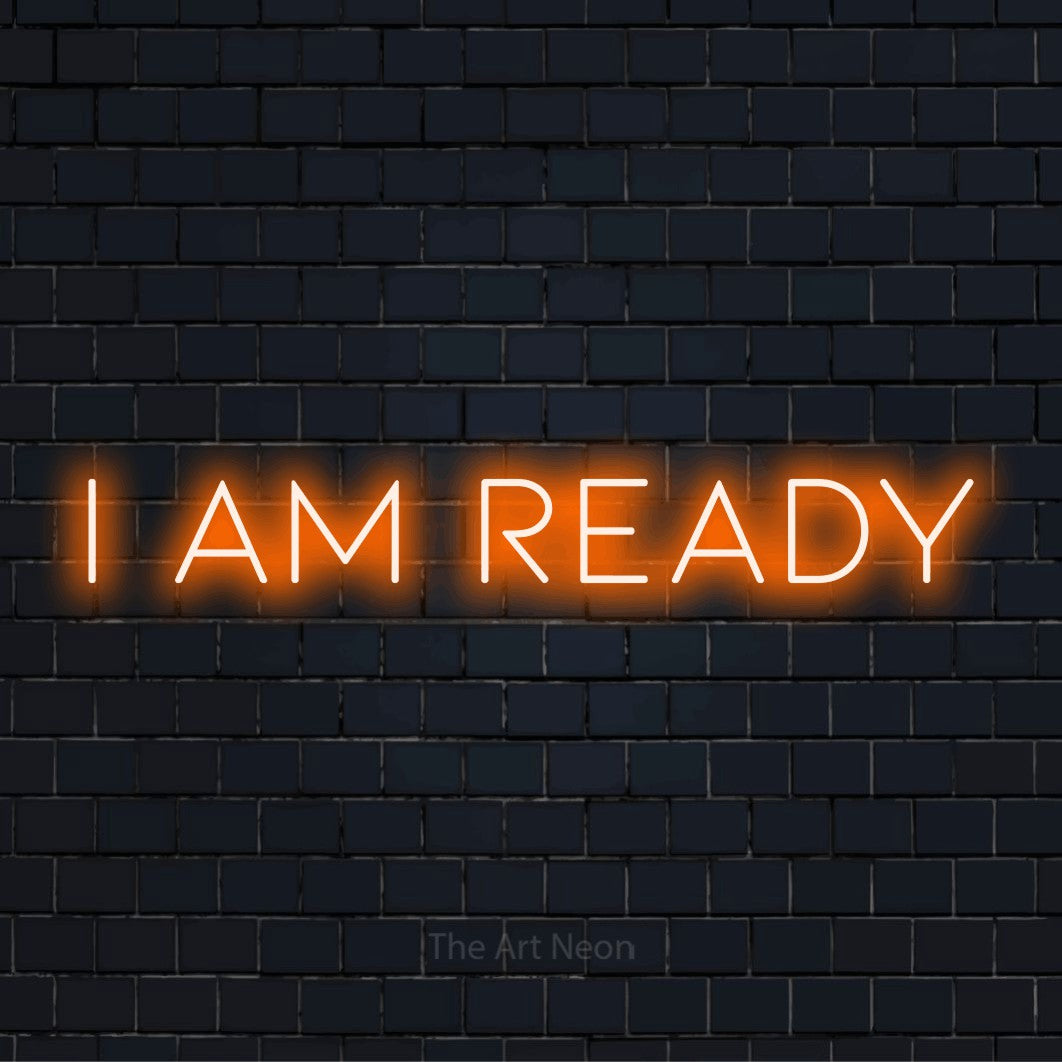 "I Am Ready" neon text design on a black brick wall