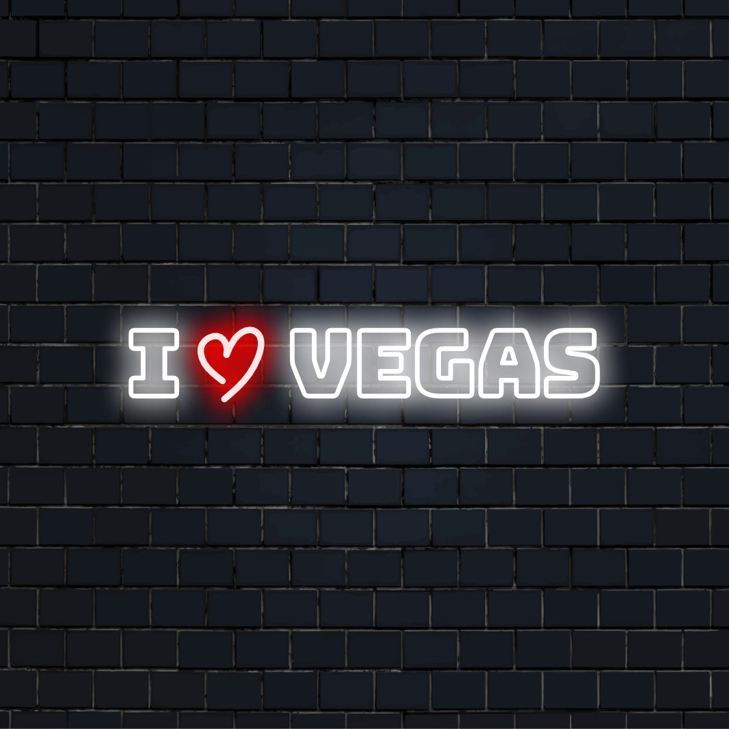 I Love Vegas LED Neon Sign, glowing neon text against black brick wall