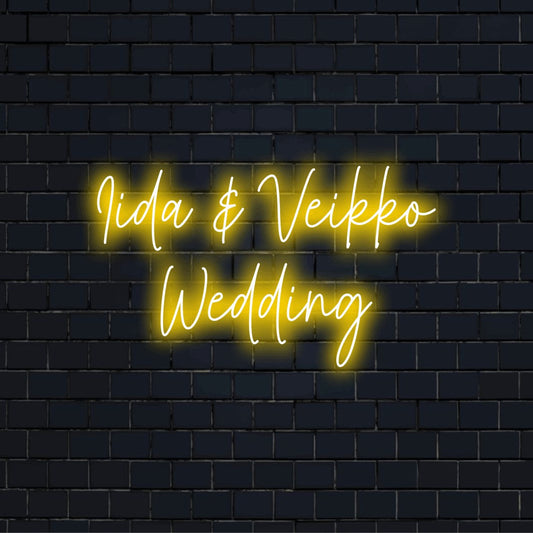 Iida _ Veikko Wedding Personalized LED Neon Sign, bright neon lettering on dark brick wall