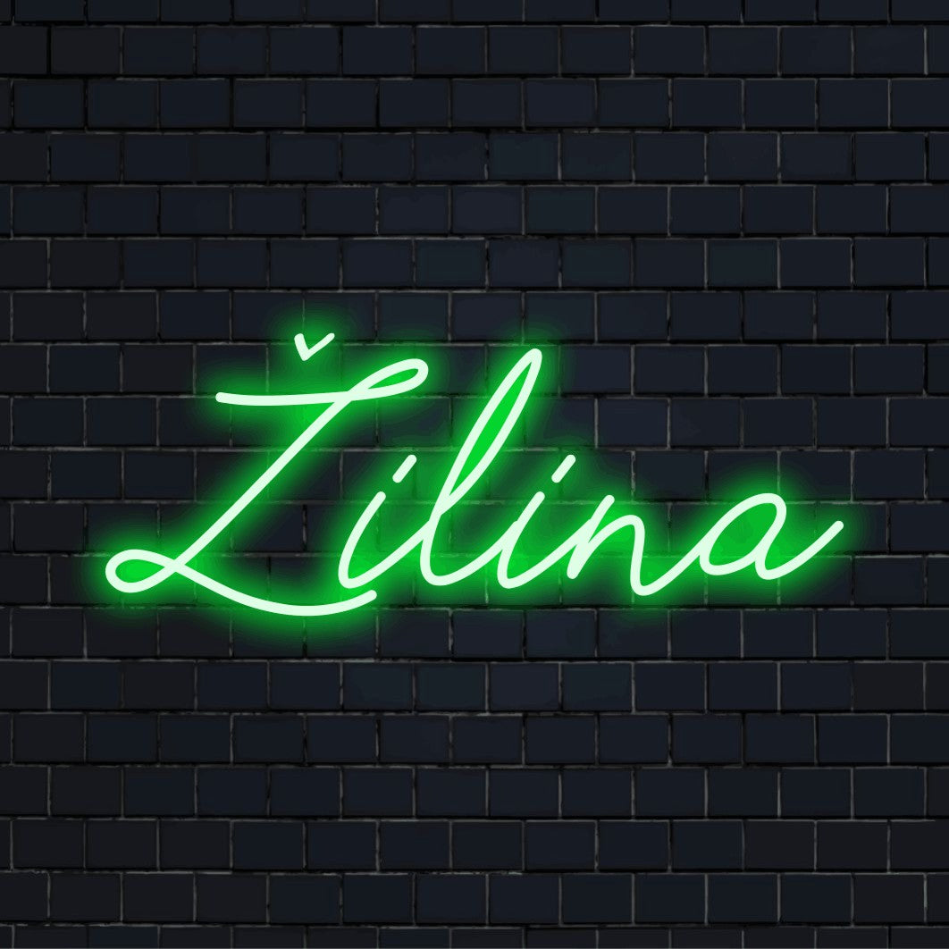 Ilina Neon Sign, soft neon glow against black brick wall