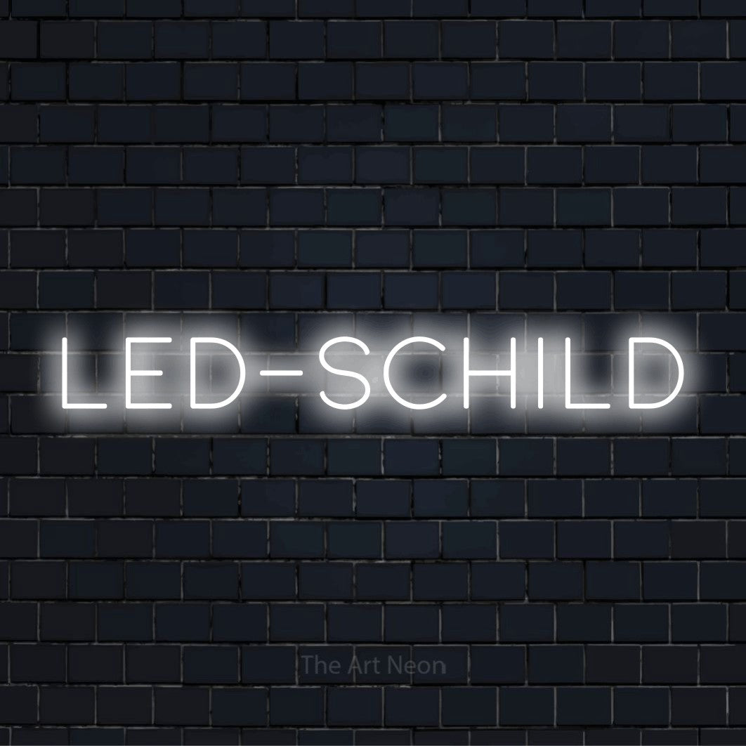 LED-Neonschild mit dem Text „LED-Schild“ auf dunkler Ziegelwand