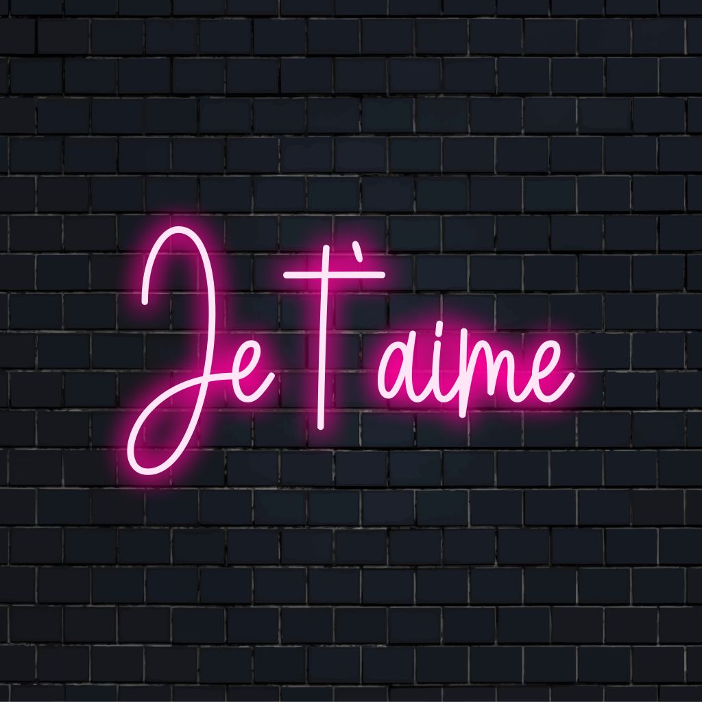 Je Taime Neon Sign, glowing wall decor against brick backdrop
