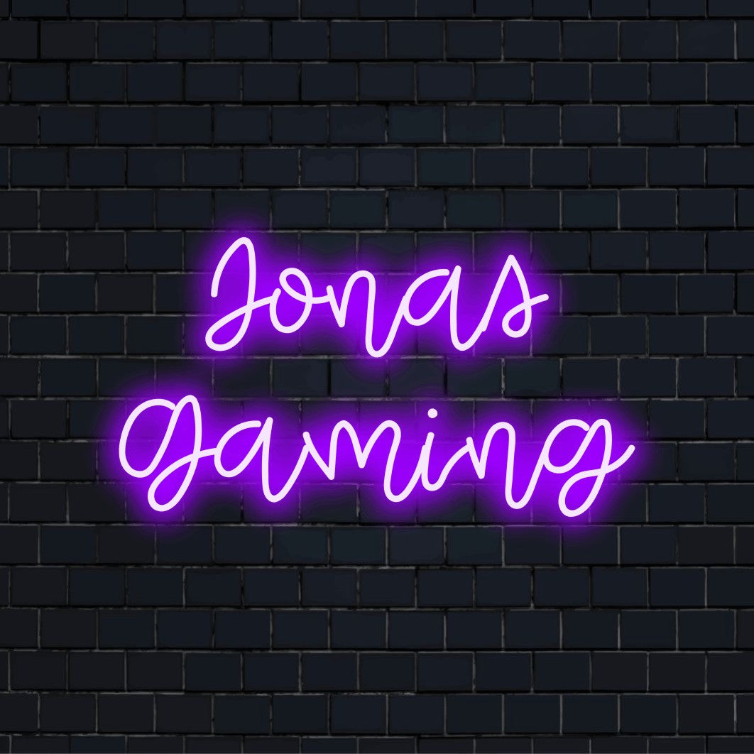 Jonas Gaming Custom Name Neon Sign, glowing neon text on dark brick background