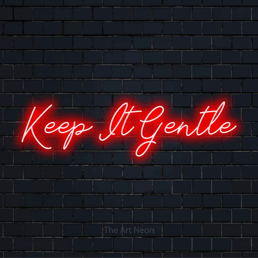"Keep It Gentle" script-style LED neon sign on a black brick wall