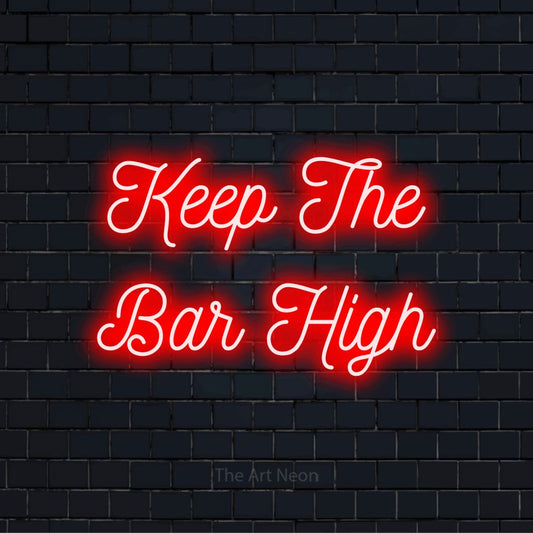 "Keep The Bar High" script-style LED neon sign on a black brick wall