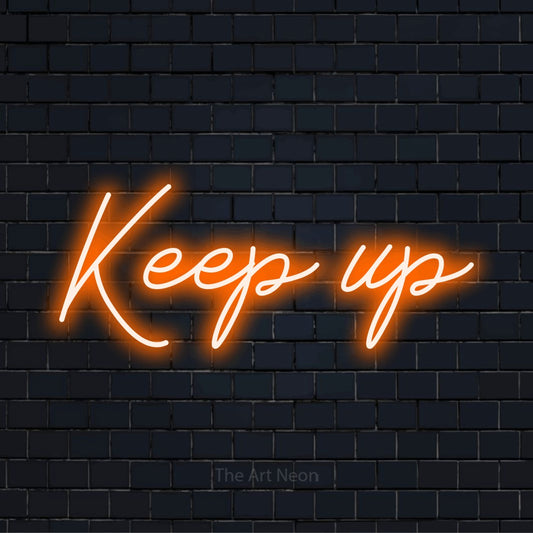 "Keep Up" glowing LED neon sign on a black brick wall