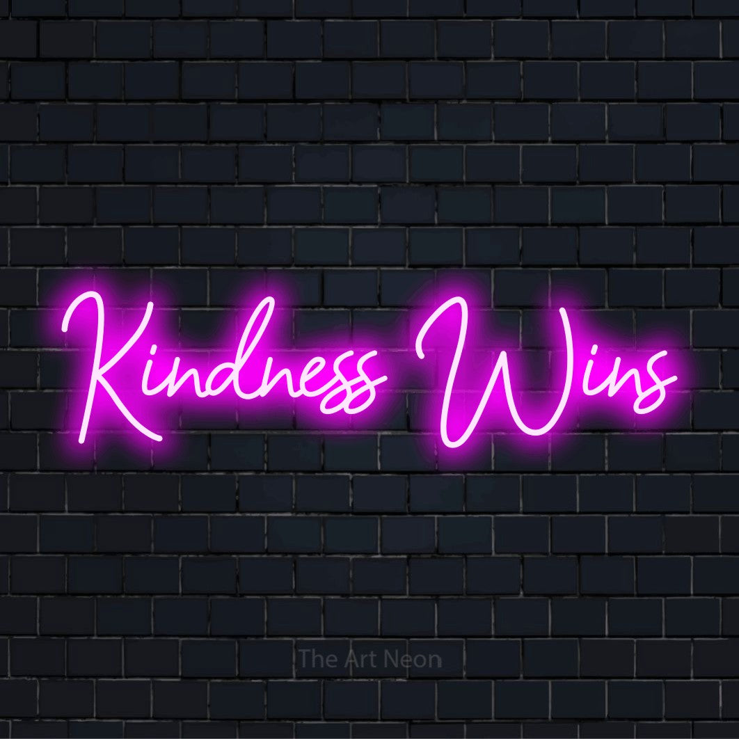 "Kindness Wins" text design with neon effect on a black brick wall