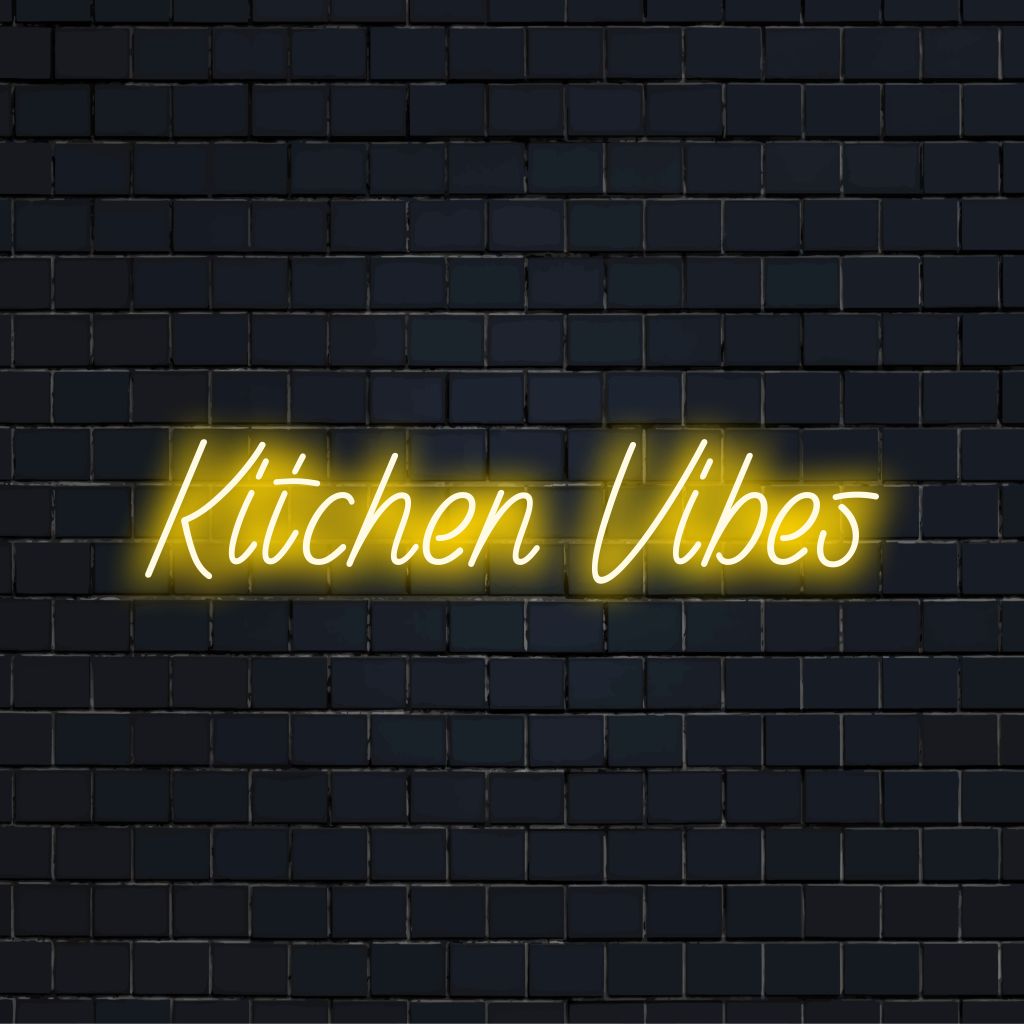 Kitchen Vibes Neon Sign, bright neon lettering against brick backdrop