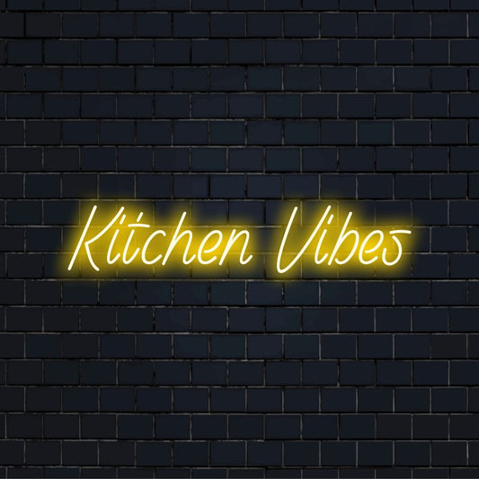 Kitchen Vibes Neon Sign, bright neon lettering against brick backdrop