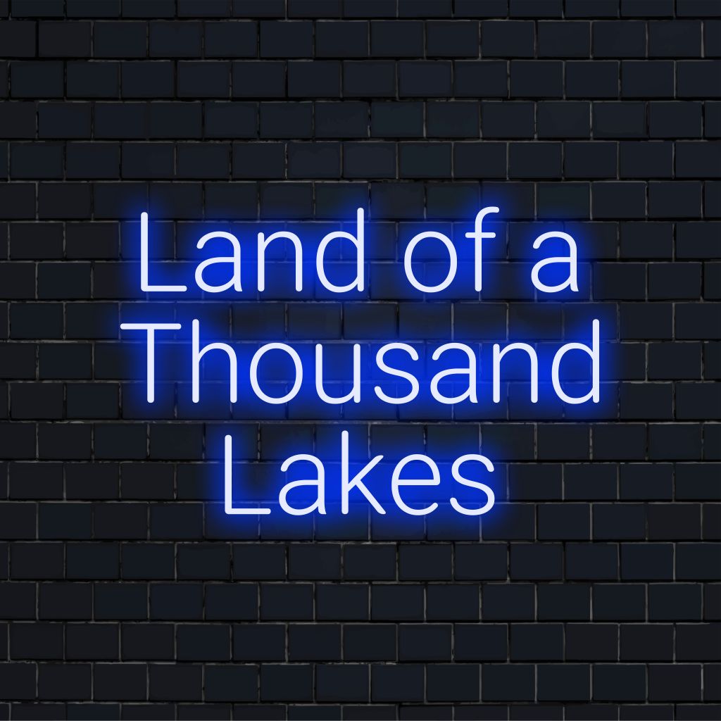 Land Of A Thousand Lakes LED Neon Sign, bright neon lettering against black brick wall