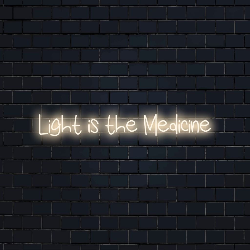 Light Is The Medicine Neon Sign, bright LED glow against black brick wall