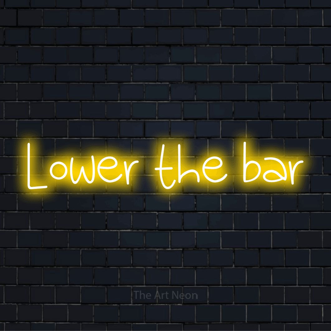 "Lower The Bar" LED neon sign on a black brick wall