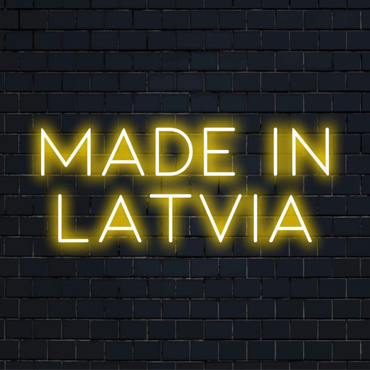 Made In Latvia LED Neon Sign, bright LED glow against brick backdrop