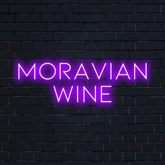Moravian Wine Neon Light with neon text light against black brick wall