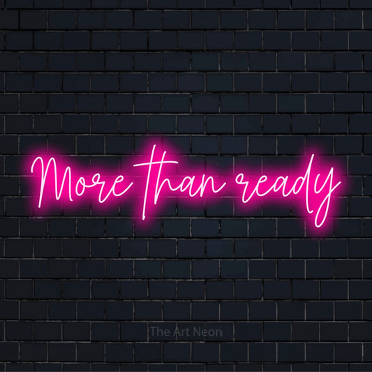 "More Than Ready" script-style LED neon sign on a black brick wall