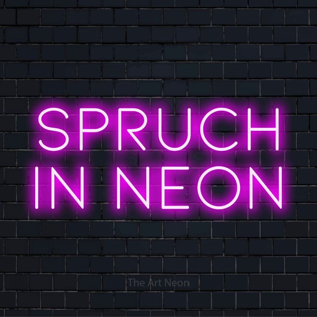 LED-Neonschild mit dem Text „Spruch in Neon“ auf dunkler Ziegelwand