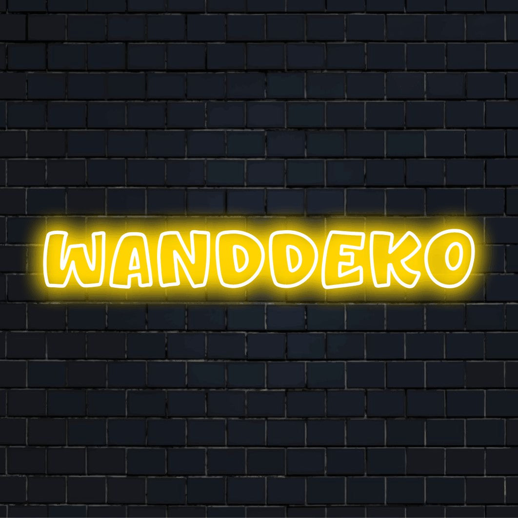 LED-Neonschild mit dem Text „Wanddeko“ auf dunkler Ziegelwand