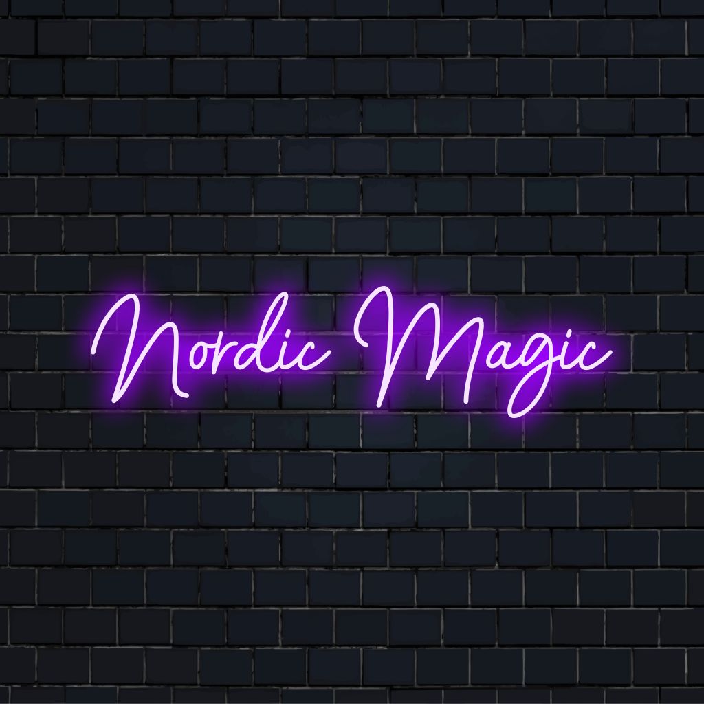 Nordic Magic Neon Sign, bright neon lettering on dark brick wall