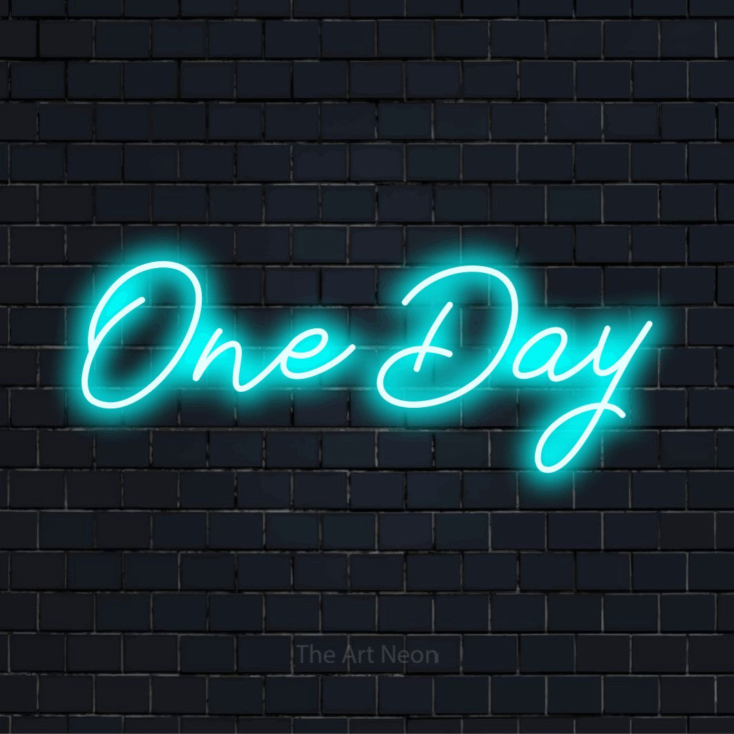 "One Day" neon text design on a black brick wall