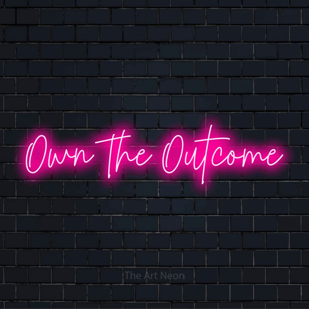 "Own The Outcome" LED neon sign on a black brick wall