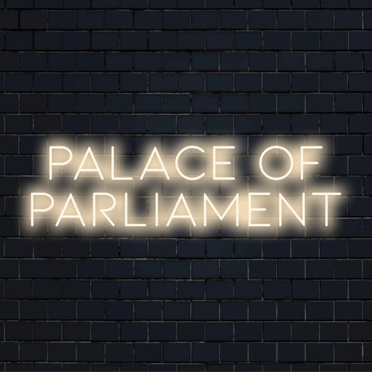 Palace Of Parliament Neon Light with neon text light against black brick wall