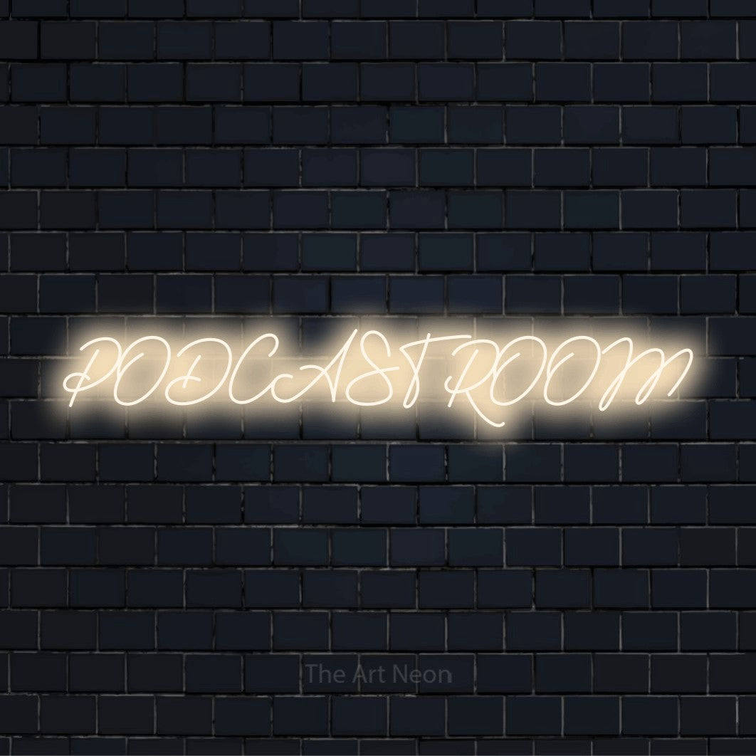 "Podcast Room" glowing LED neon sign on a black brick wall