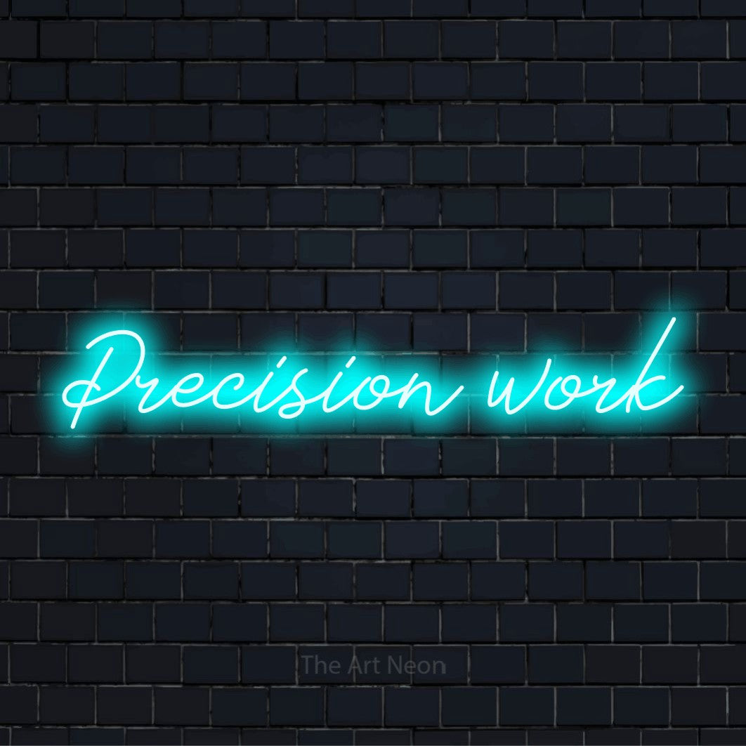 "Precision Work" script-style LED neon sign on a black brick wall