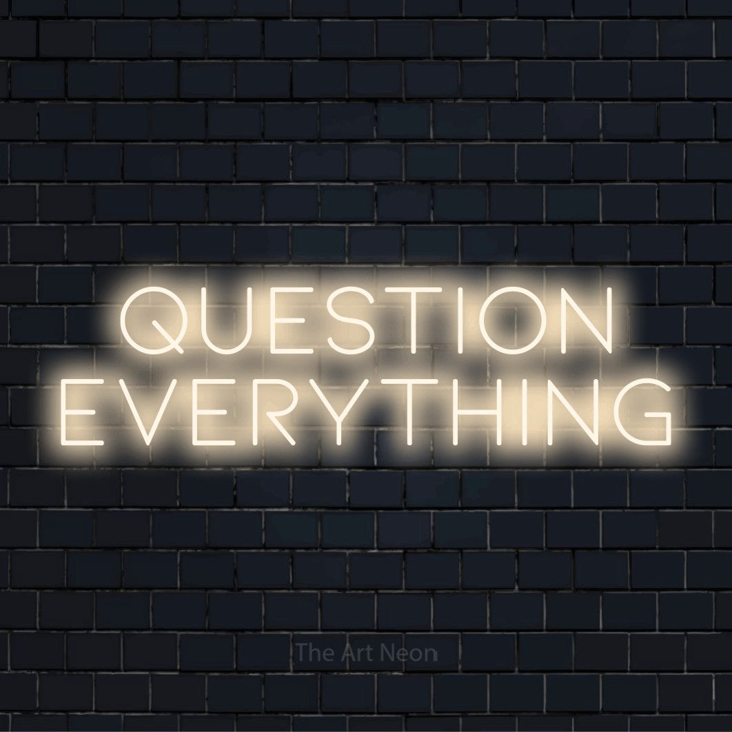 "Question Everything" text design with neon effect on a black brick wall