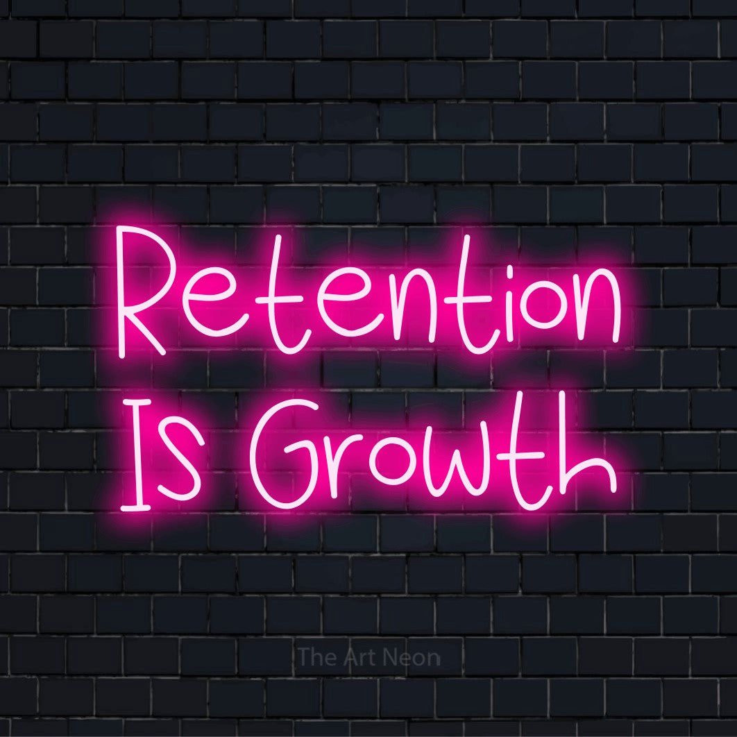 "Retention Is Growth" script-style LED neon sign on a black brick wall