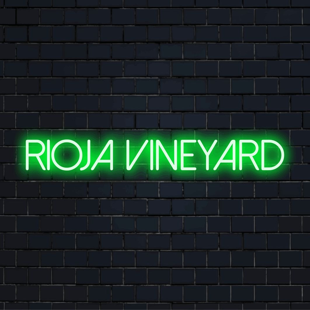 Rioja Vineyard LED Neon Sign, bright neon glow on black brick background