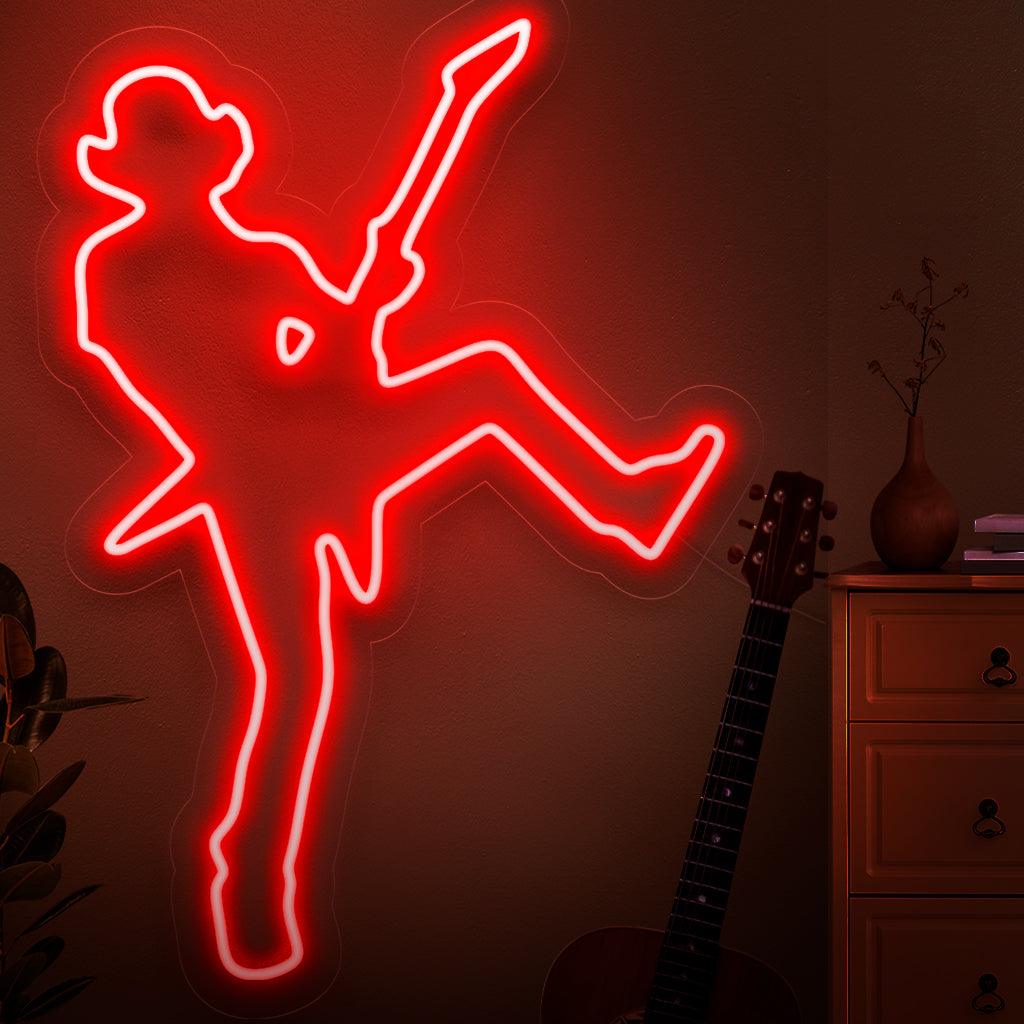 Um letreiro de neon dinâmico com a silhueta de uma estrela do rock, capturando a energia e o carisma de uma apresentação musical ao vivo.