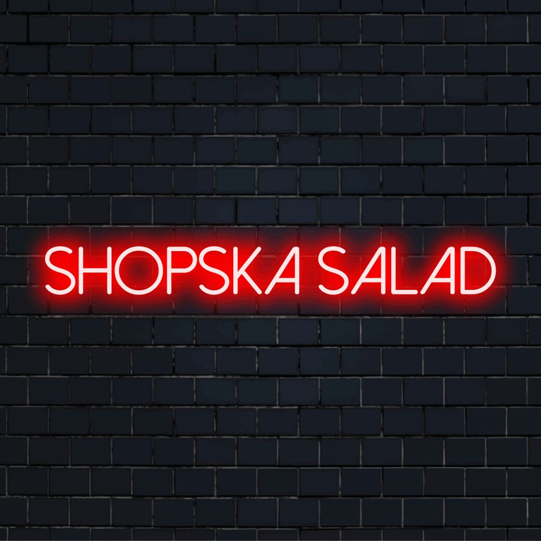 Shopska Salad LED Neon Sign, bright neon lettering on dark brick background