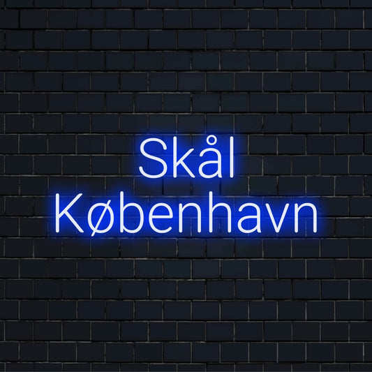 Sk L K Benhavn Neon Light with soft neon glow on dark brick wall