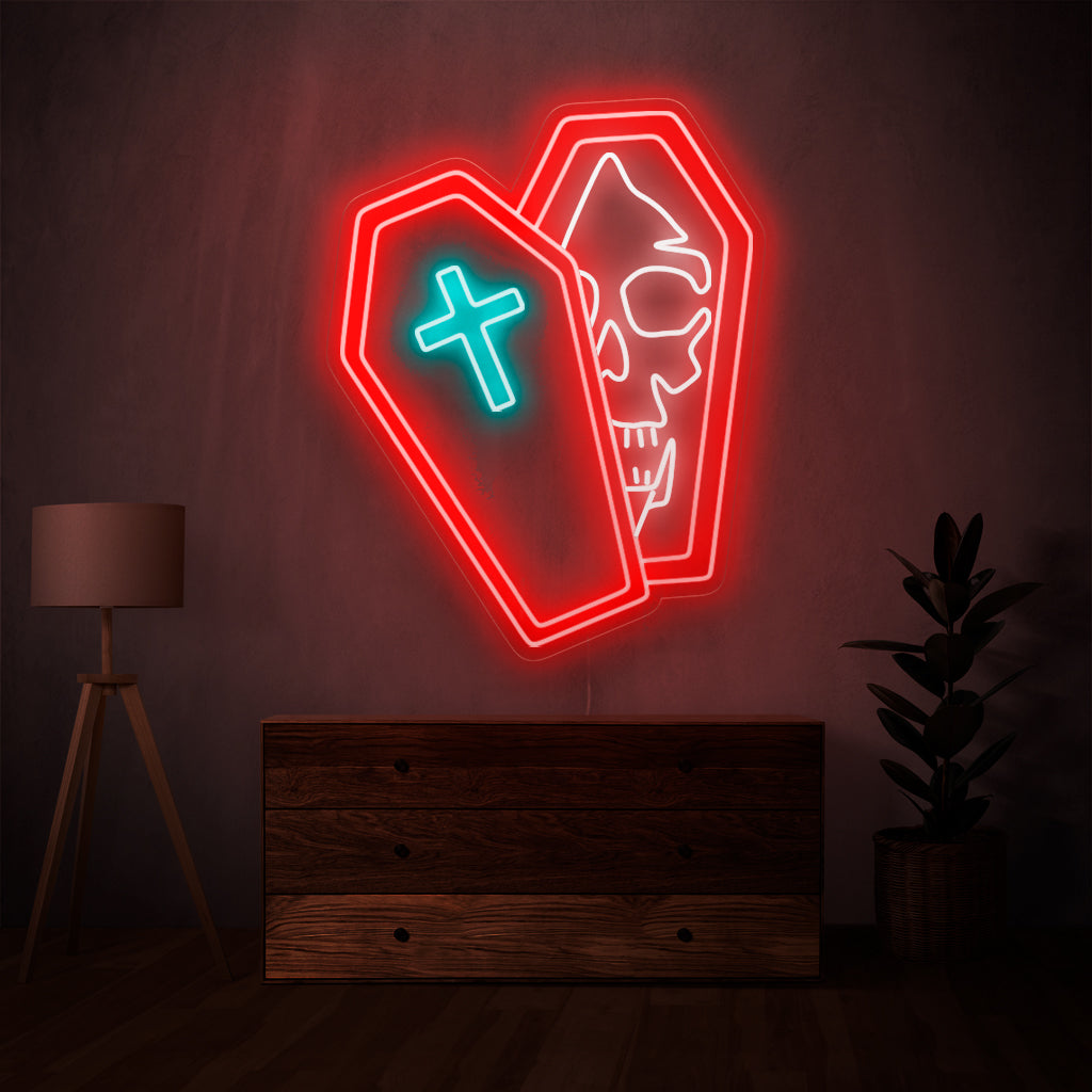 O crânio em um caixão em neon é uma adição macabra à decoração com tema assustador, emanando uma luz misteriosa e cativante.