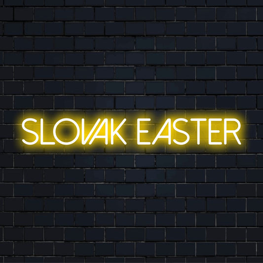 Slovak Easter Neon Light with neon text light against black brick wall