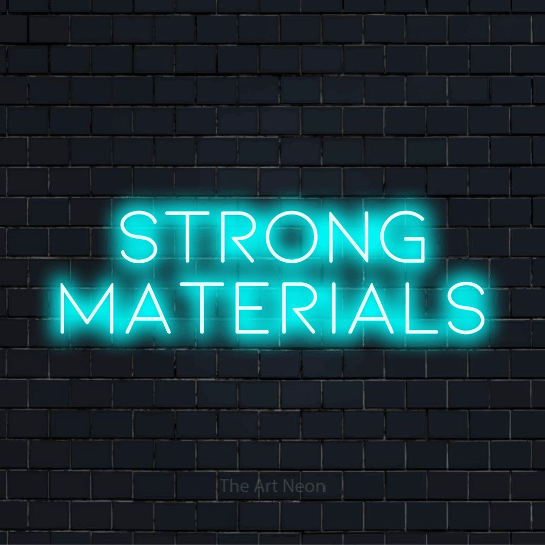 "Strong Materials" text design with neon effect on a black brick wall