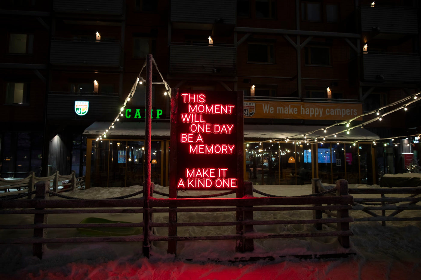 Outdoor LED neon text installation at Ruka Polar Night Light Festival in Finland
