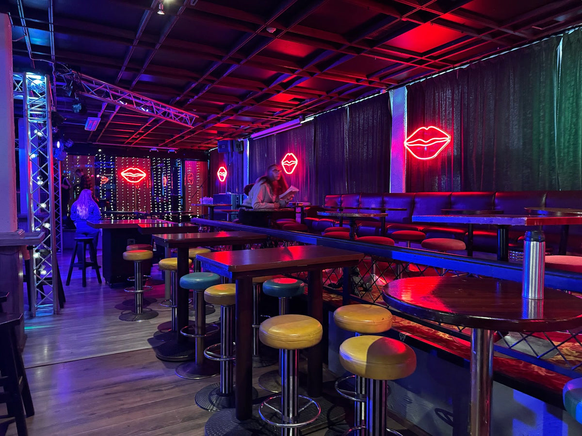Red lip-shaped LED neon signs used on a Solar Films production set in Finland