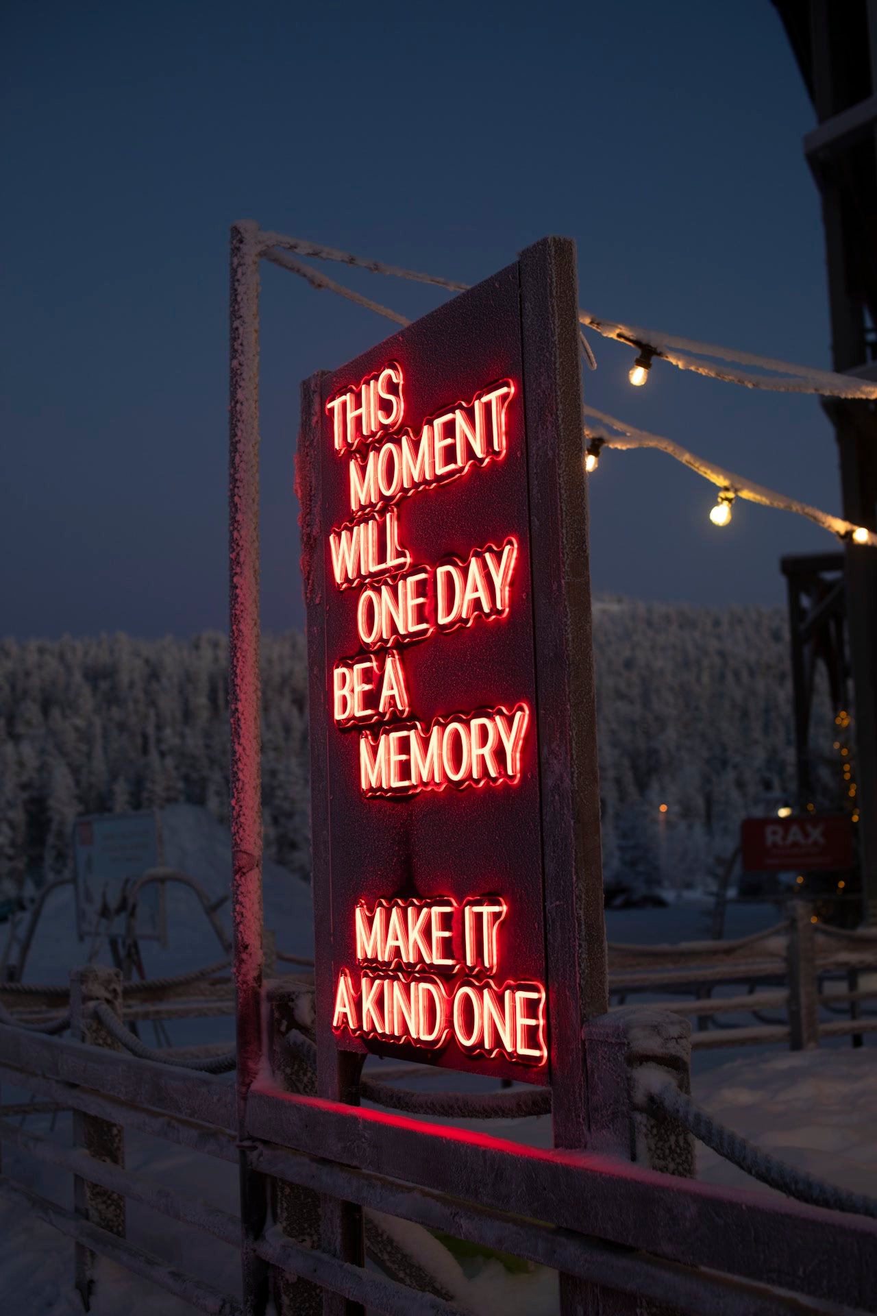 Outdoor LED neon text installation at Ruka Polar Night Light Festival in Finland