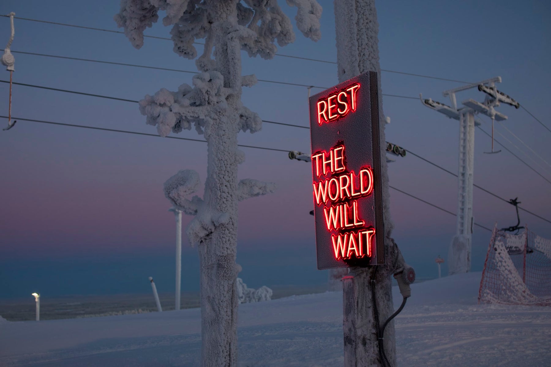 Outdoor LED neon text installation at Ruka Polar Night Light Festival in Finland