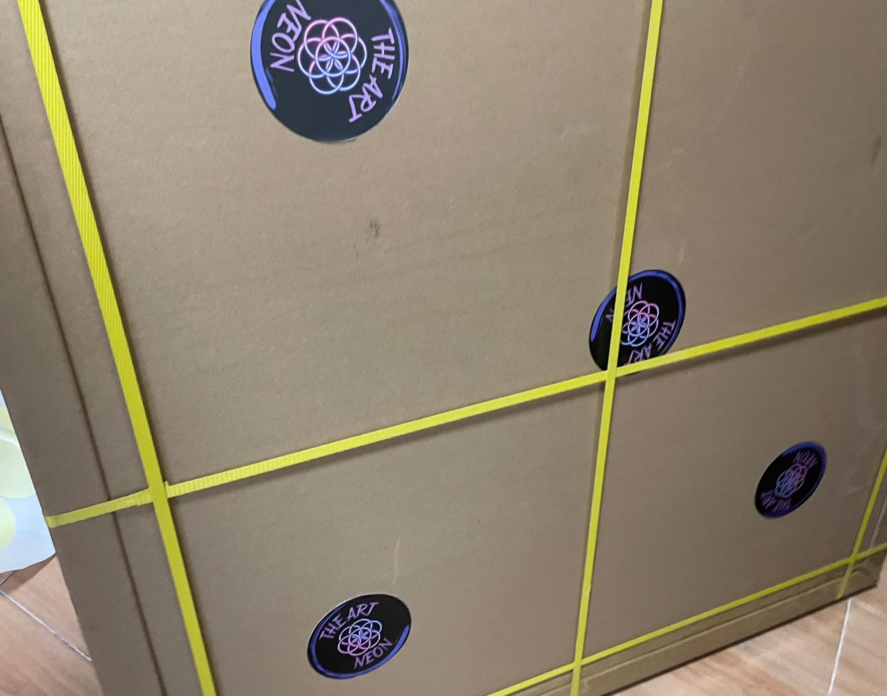 The Art Neon branded cartons strapped and ready for dispatch